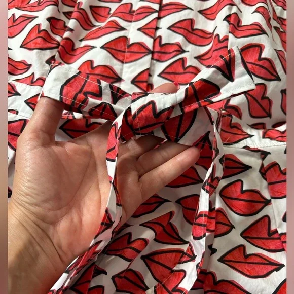 Anthropologie Red Smooch Dress. All Over Red Lip Design. Button Front. Pockets. - Picture 11 of 16